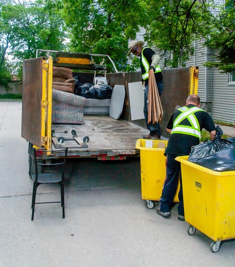 Big 40-yard garbage bin rental placed in a Winnipeg commercial construction site
